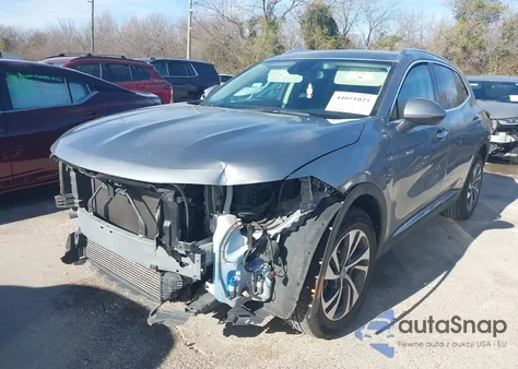 2023 Buick Envision Essence Fwd z USA, uszkodzony, nr VIN LRBFZNR44PD069973